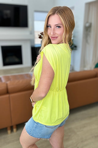 Rhea Peplum Top in Neon Yellow - Fashion Are Us, LLC