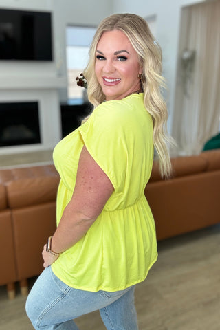 Rhea Peplum Top in Neon Yellow - Fashion Are Us, LLC