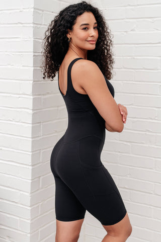 Sun Salutations Body Suit in Black - Fashion Are Us, LLC