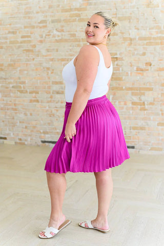 Just a Flirt Pleated Skirt in Magenta Ave Shops