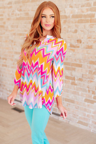 Lizzy Top in Orange Multi Chevron - Fashion Are Us, LLC