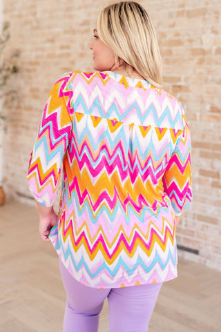 Lizzy Top in Orange Multi Chevron - Fashion Are Us, LLC